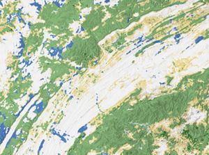 A screenshot of a geospatial map with geographic features including water and elevated terrain highlighted with different colors.