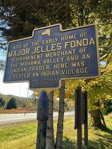 A historic marker features historical information about a local merchant and indian trader.