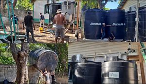 People setting up water and sanitation equipment.