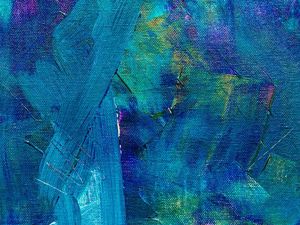 shades of blue paint on canvas with a touch of green