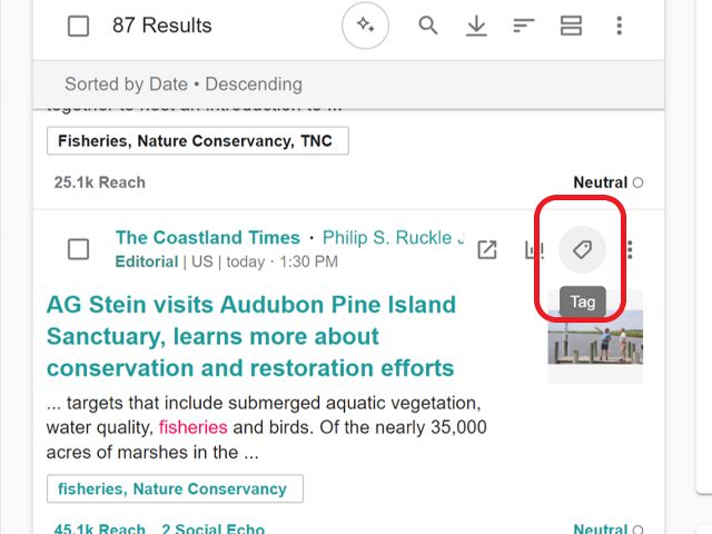 Screenshot of Meltwater search screen in Explore with an item centered and the "tag" icon visible and circled in red