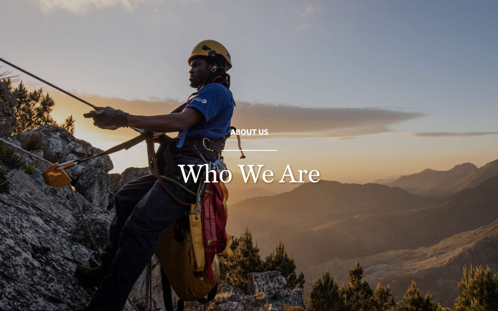 Sunset photo of rock climber and navigational text overlay: 'About Us, Who We Are'.