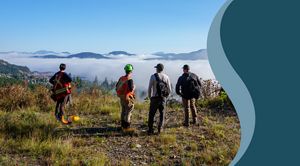 People overlooking a mountain vista