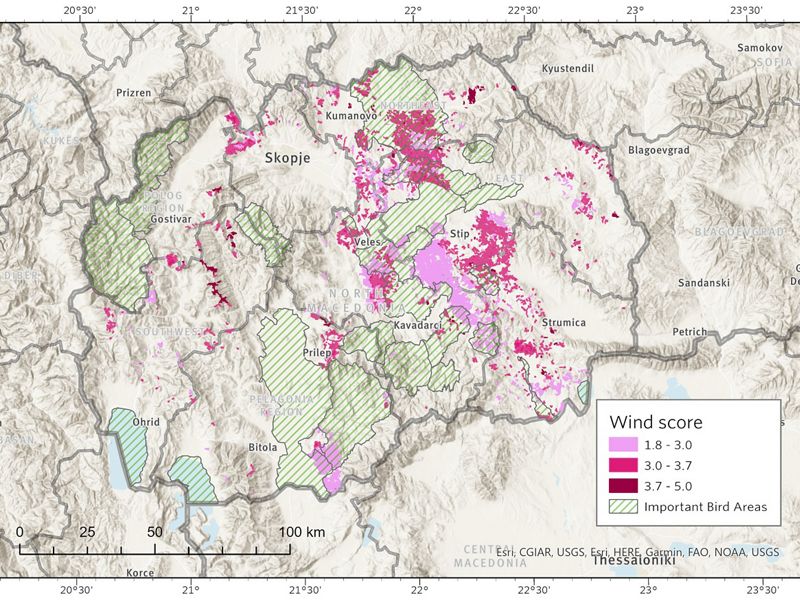Topographic map of North Macedonia with areas highlighted in red showing potential for wind power siting and generation.