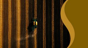 A tractor in a field from above