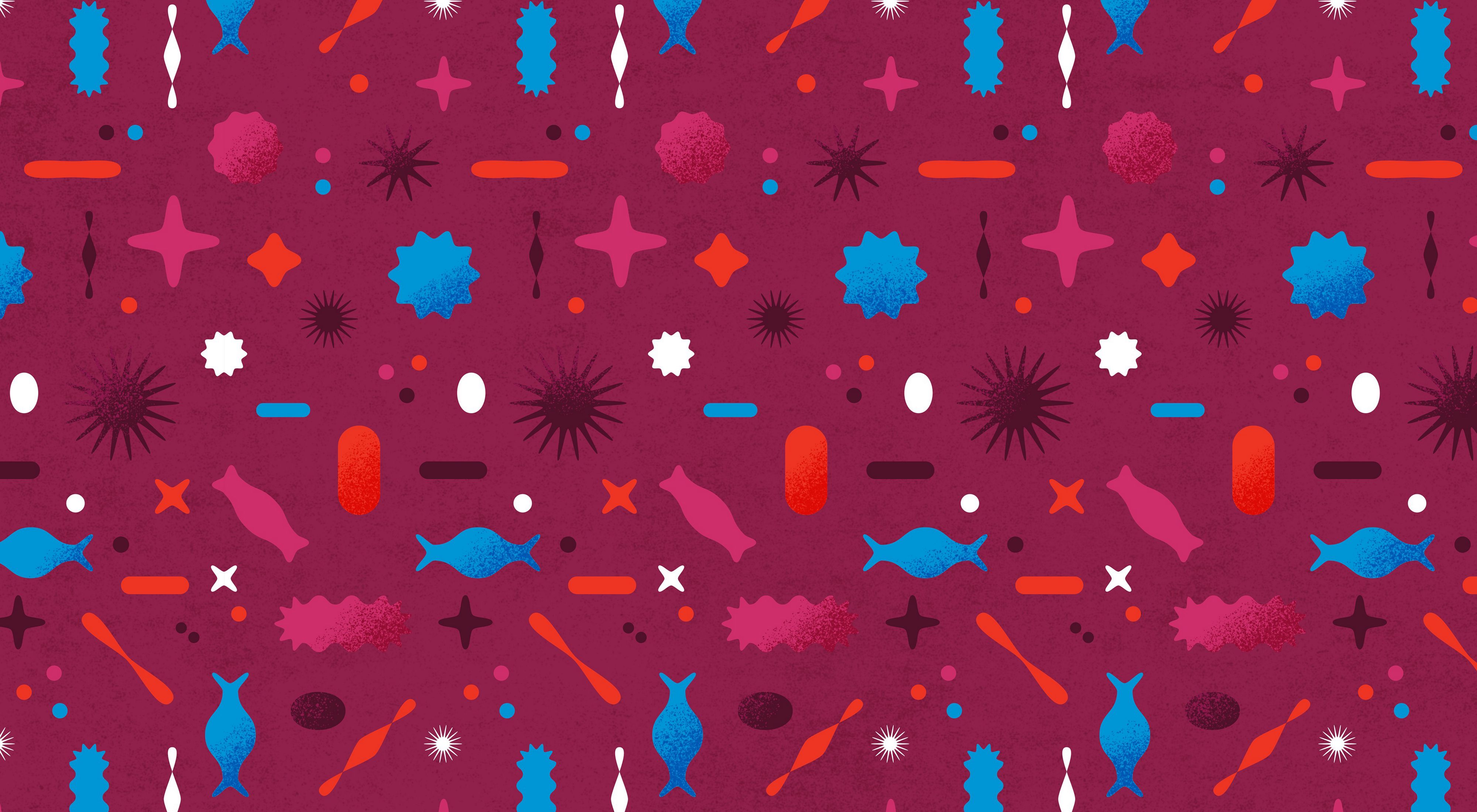 a pattern of abstract shapes representing microscopic organisms in reds, maroons, and blues