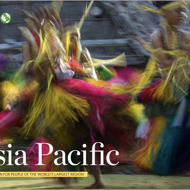 Blurred image of dancers in Papua New Guinea.