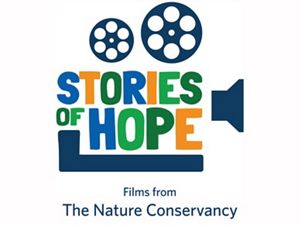 Stories of Hope logo, shaped like a video camera with film reels on top of it.