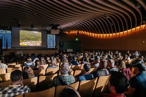 Attendees gather for opening plenary.