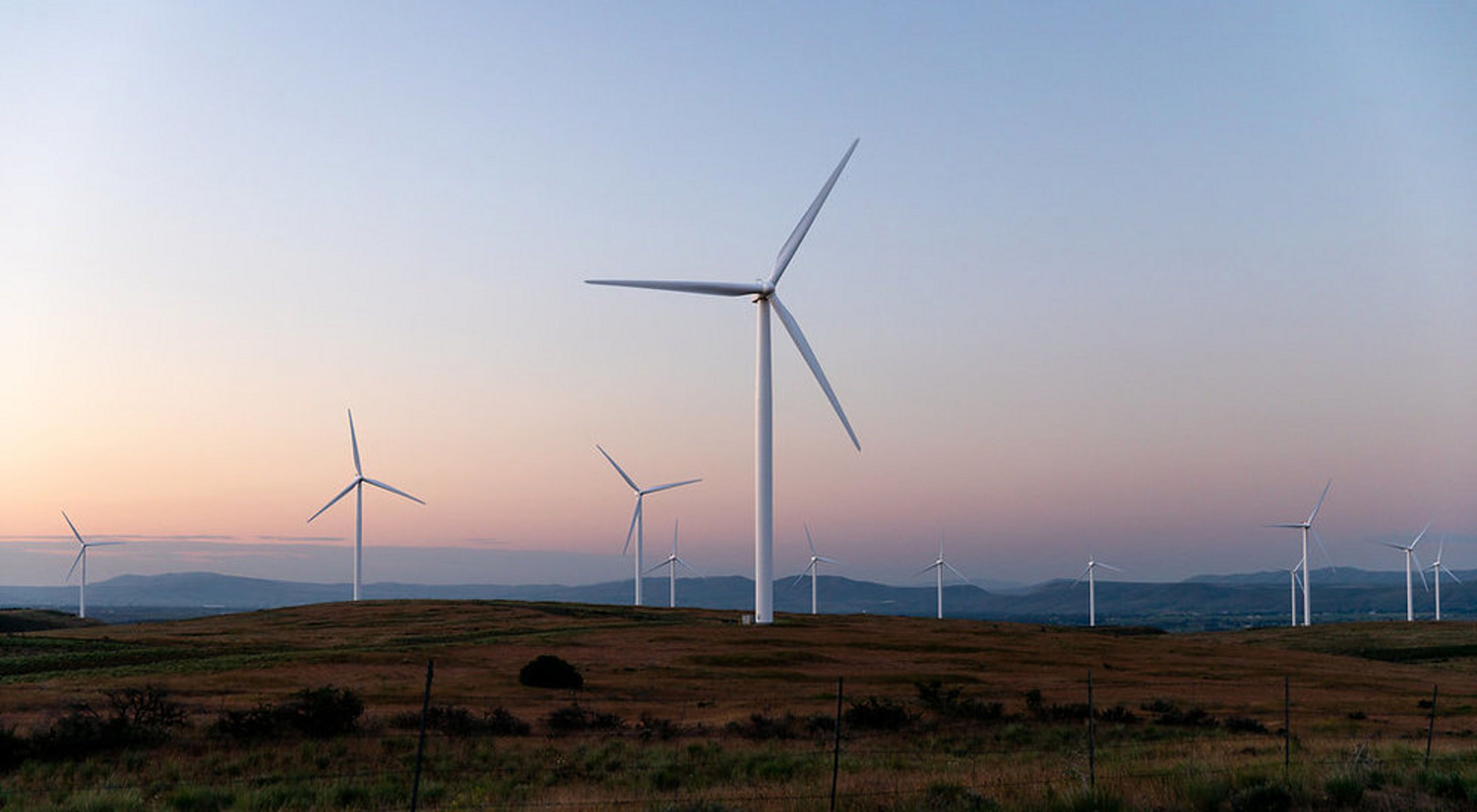 Photo of a dozen wind turbines in Kittitas Valley, Washington state.