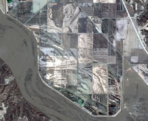 Satellite imagery showing river and farmlands.