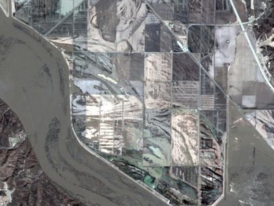 Satellite imagery showing river and farmlands.