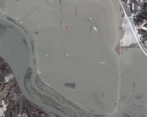 Satellite imagery showing river and flooded land.