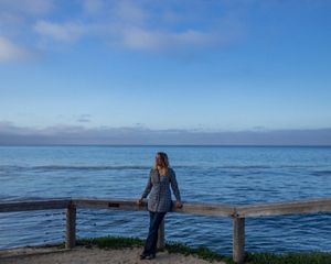 Heather Tallis on an overlook of the Pacific Ocean.