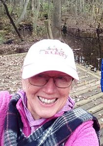 A selfie of Deborah Dalley Phillips outdoors.