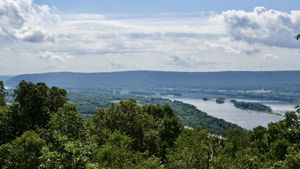 Scenic view from the Appalachian Trail. The wide, smooth Susquehanna River flows below the vantage point curving to the left towards the Hamer Woodlands at Cove Mountain ridge line.
