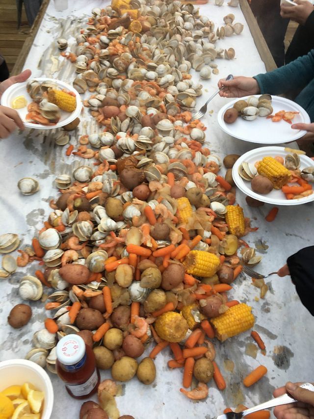 Boiled shrimp, corn and white potatoes are spread out on newspaper for an Eastern Shore feast.