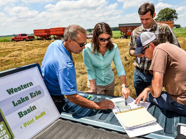 Conservancy scientist Carrie Vollmer-Sanders (second from left) works with partners in the Western Lake Erie Basin to protect water quality while maximizing crop production. Lake Erie provides drinking water to an estimated 11 million people. © Randall Schieber