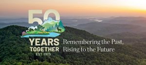Kentucky's Appalachian Mountains with the graphic for our 50th Anniversary superimposed on the image.