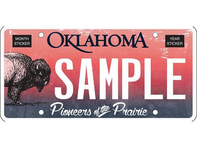 Bison on a pink and purple background of a speciality license plate.