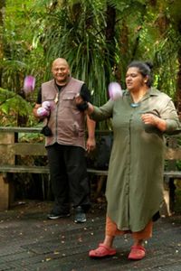 Two people demonstrating something with their hands.