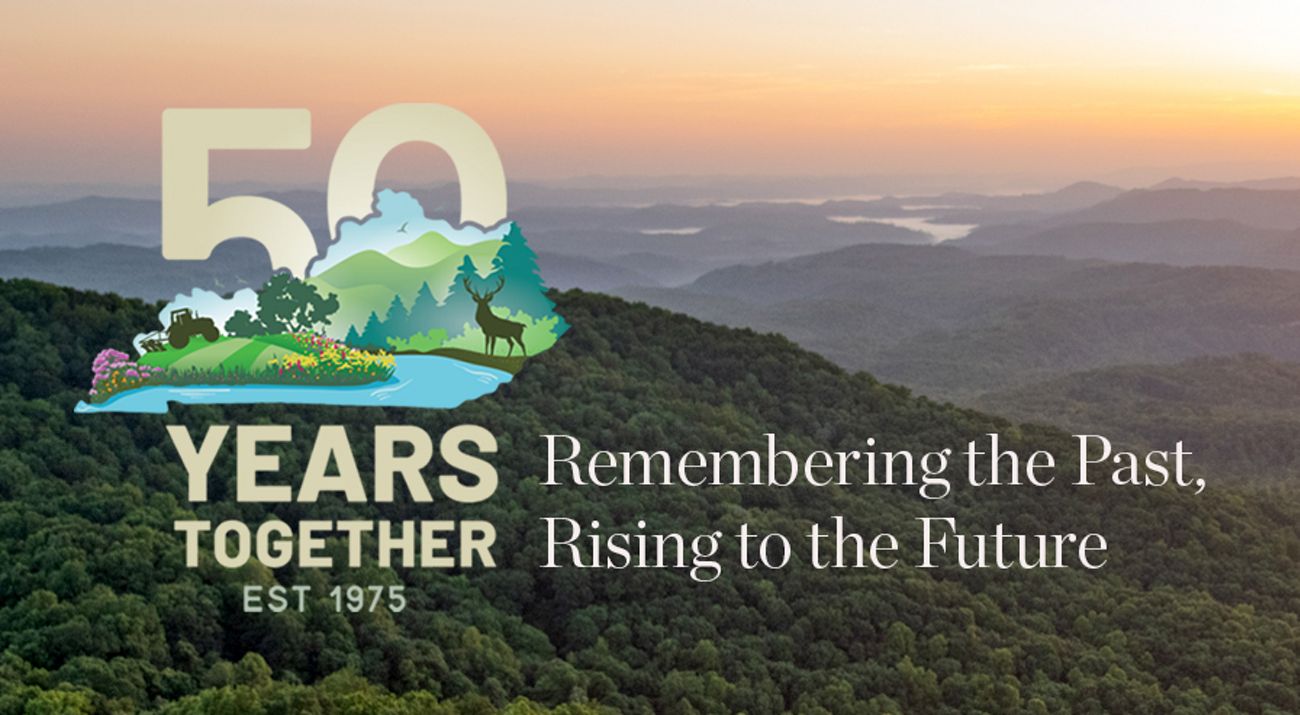 Kentucky's Appalachian Mountains with the graphic for our 50th Anniversary superimposed on the image.