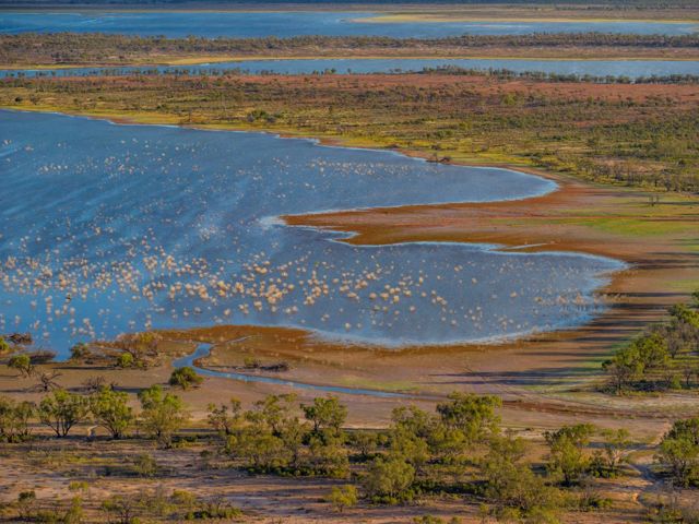 Low lying lands are interspersed with wetlands.