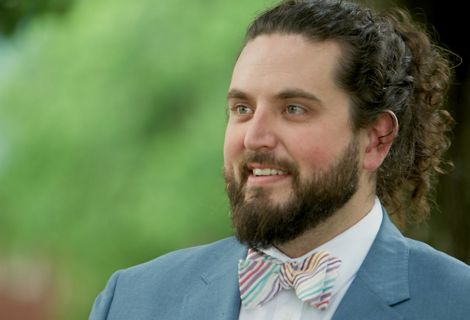A photo of Boone Bowling, a smiling man with a beard and a bowtie.