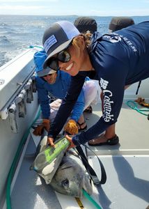 Conservation science volunteer participating in research on pelagic fish.