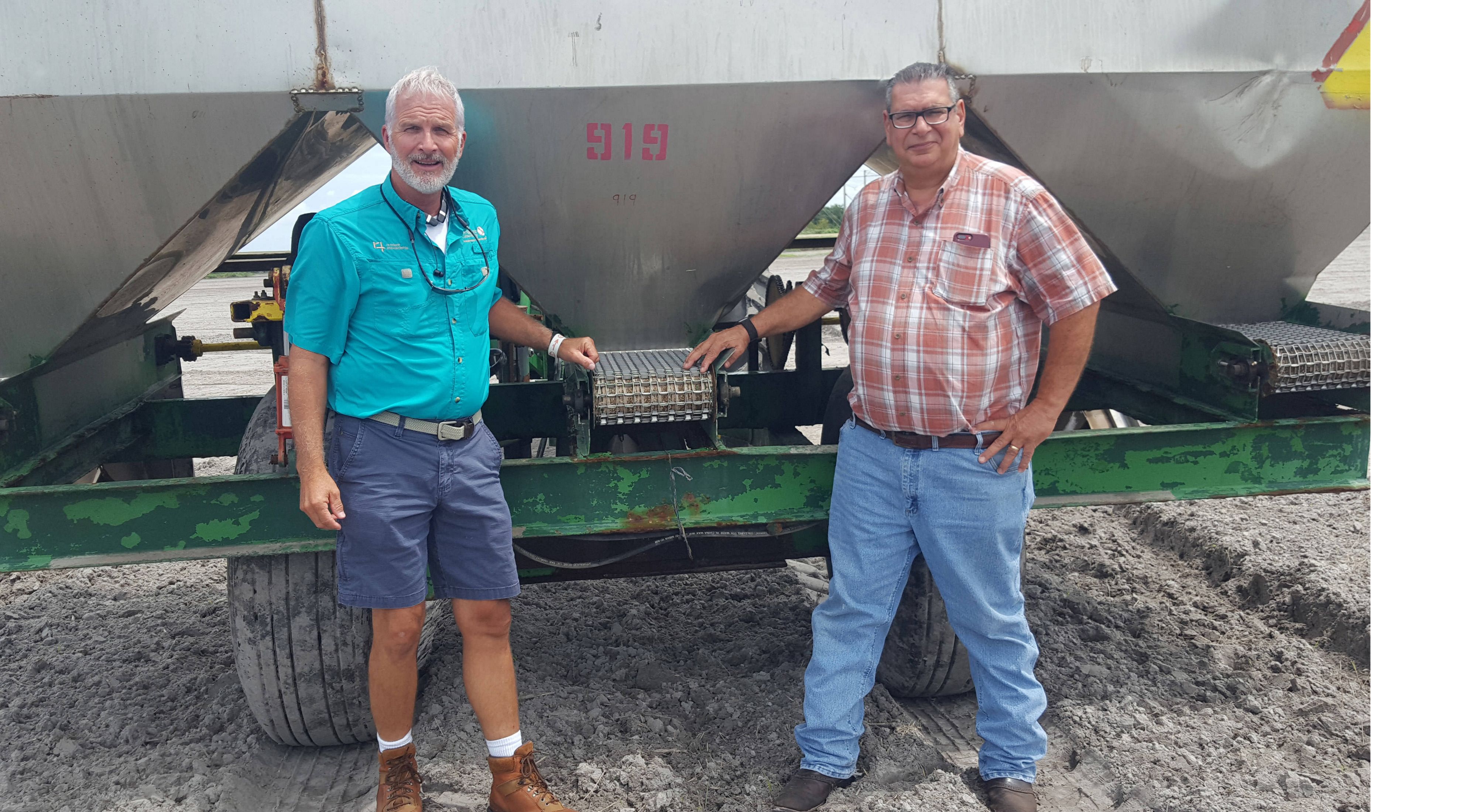 TNC's David Royal (left) and Florida farmer Robert Sam had many conversations about how conservation ag practices can save money, produce a good crop and help the environment.
