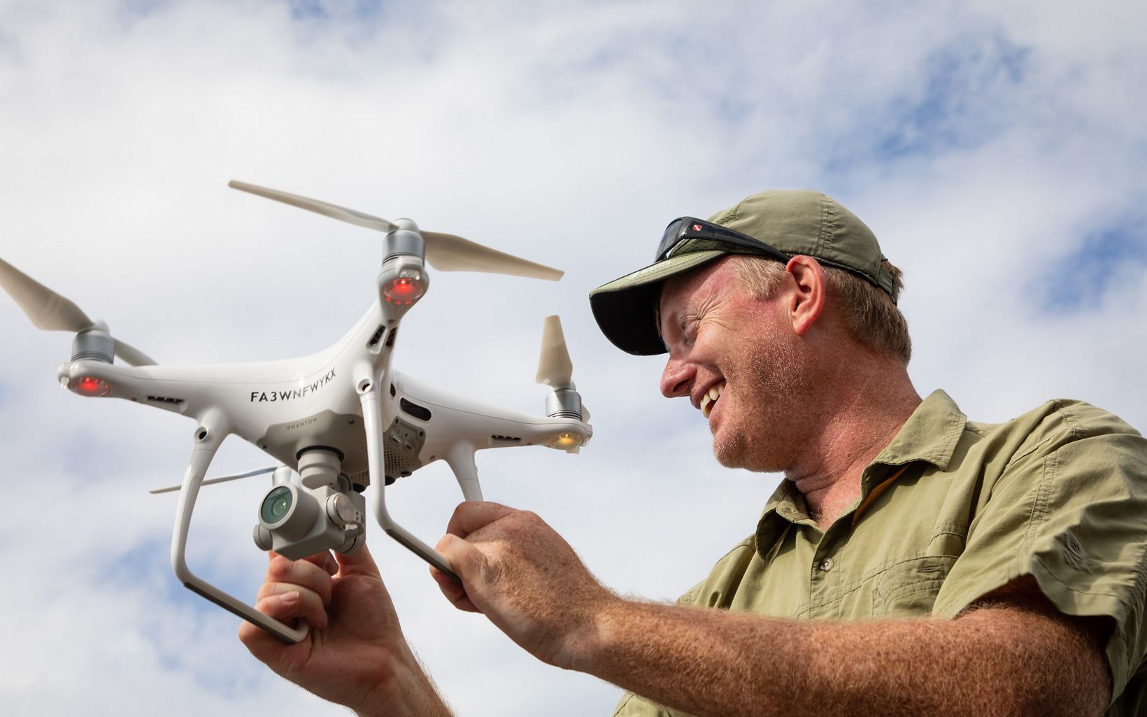 (8/10) Dr. Steve Schill, Lead Scientist for TNC in the Caribbean, launches an aerial drone that will help validate the accuracy of data collected by satellites and the GAO. © Marjo Aho