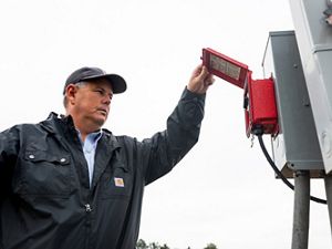 Growers like rice farmer Kotton Guest have found that using new irrigation timers (pictured) save them time in the fields, money--and precious water resources.