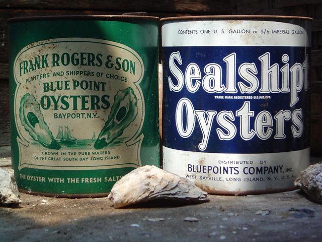 At one time there were 25 oyster shucking houses lining the shores of Great South Bay, filling cans like the ones shown above, displayed at Long Island's Maritime Museum. 