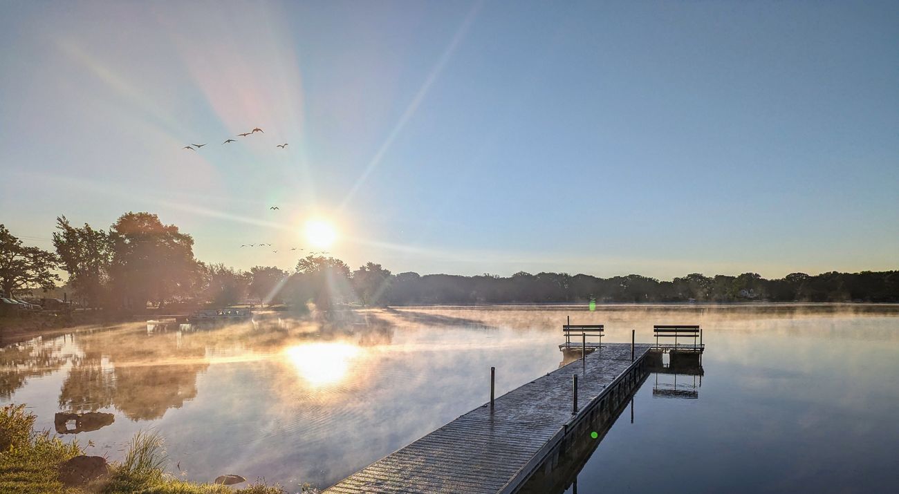 Dock overlooking lake in in Iowa.