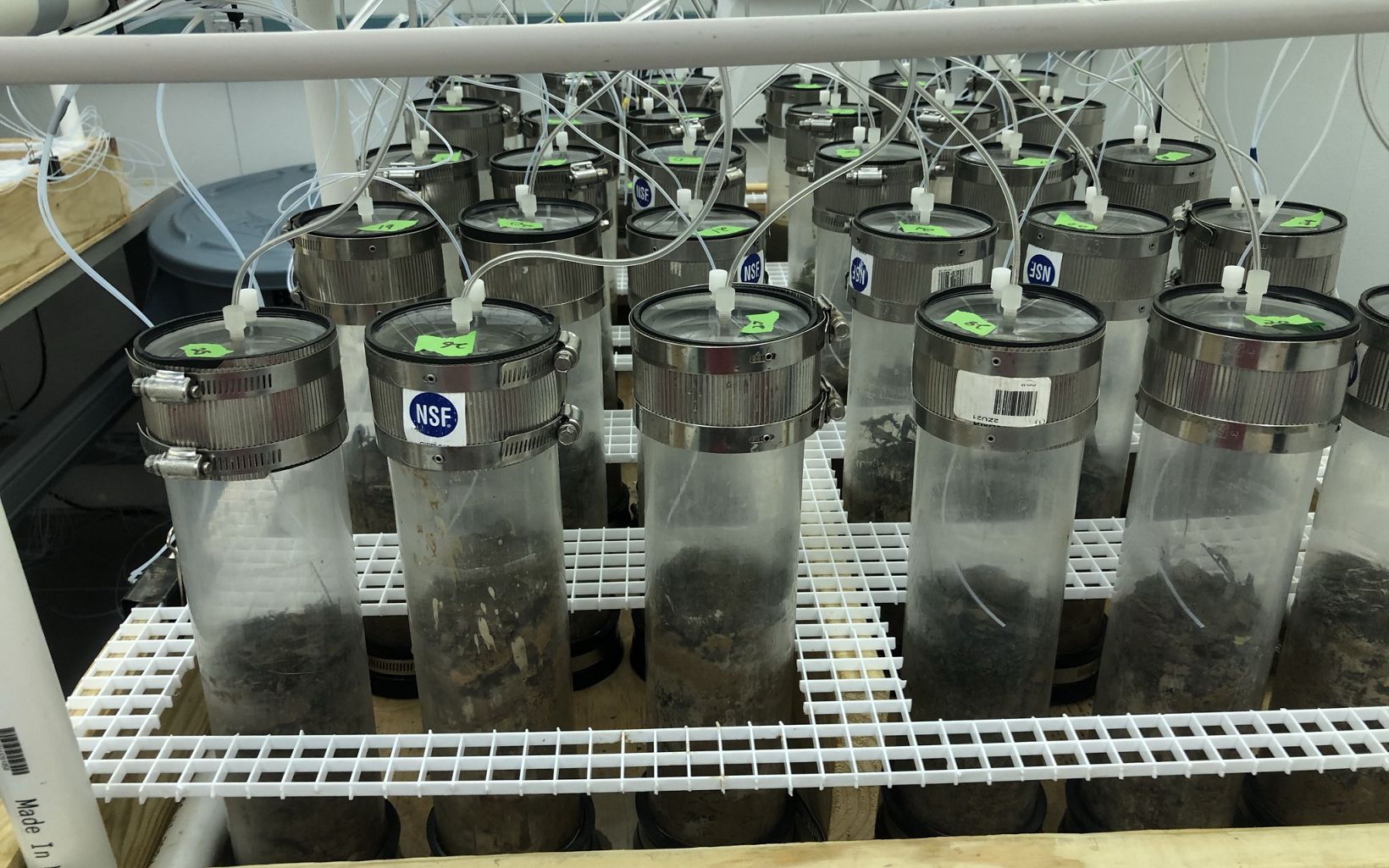
                
                   Collected samples are studied in this flow through incubation system to measure nutrient retention and greenhouse gas production in wetland easement soil/sediment cores.
                  
                
              