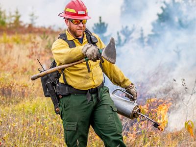 Prescribed burn on the grassland at The Nature Conservancy's Kennebunk Plains Preserve in Kennebunk, Maine.