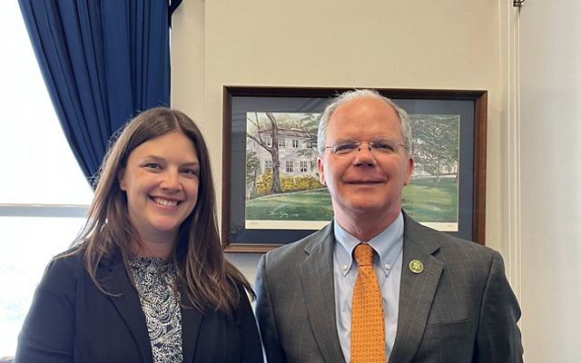 TNC in Kentucky's director of external affairs, Heather Jeffs, meets with Congressman Guthrie in his office in front of a painting.