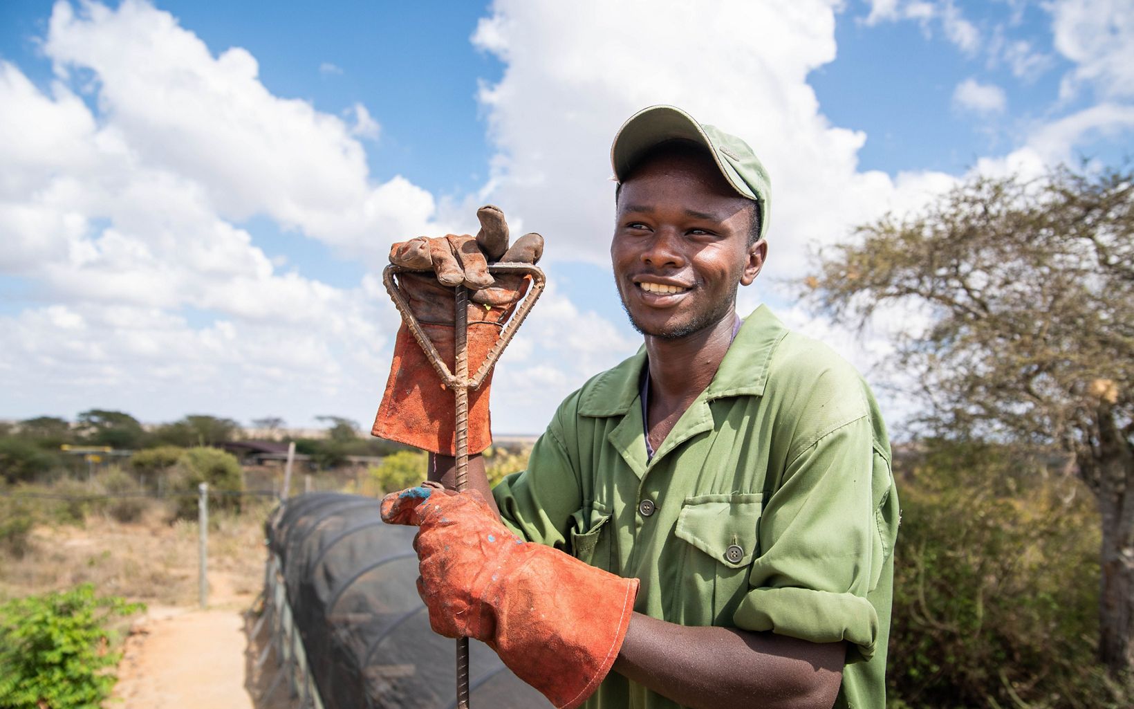 Hard at Work Opuntia removal creates job for members of the local communities, like Peter Eloto, 24.  © Roshni Lodhia