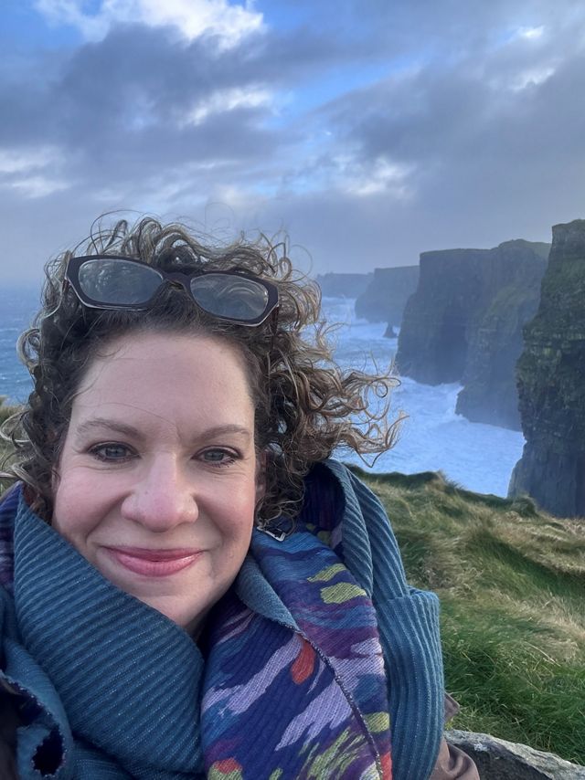 A selfie of Lori Brennan at the Cliffs of Moher.