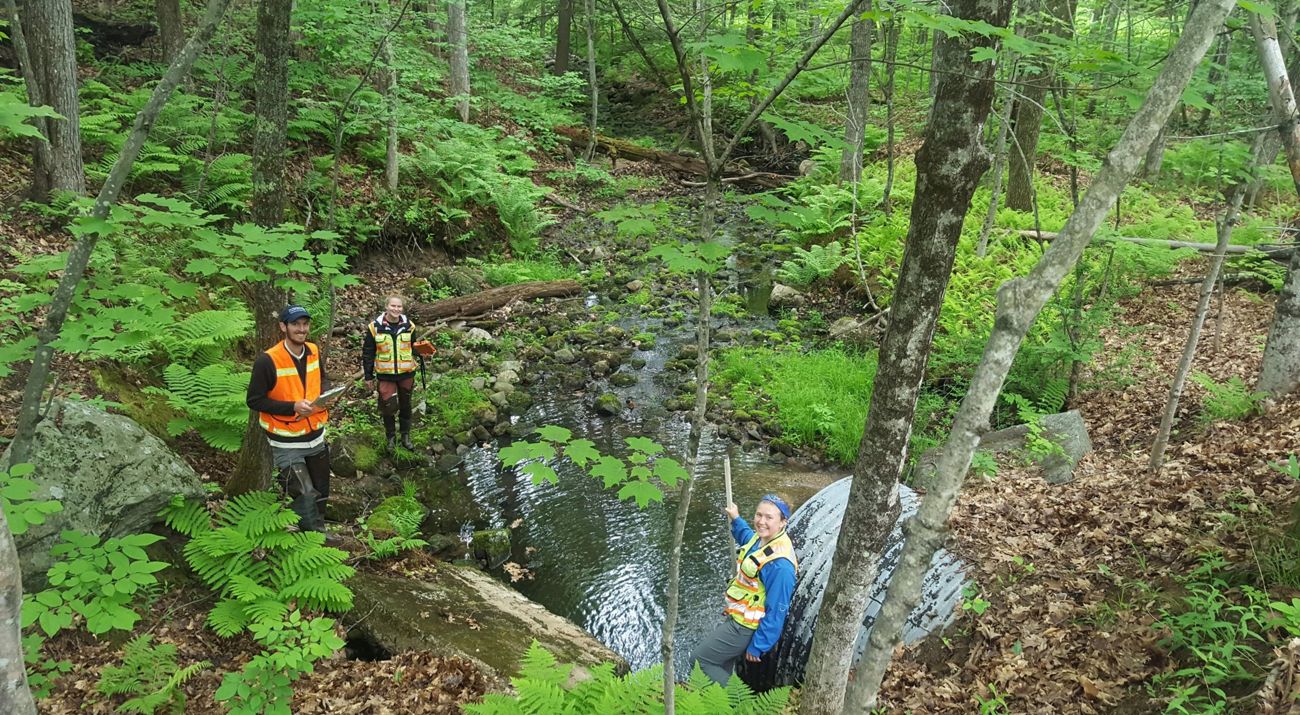 Hadley Couraud and colleagues traveled the state taking measurements of culverts and stream data.