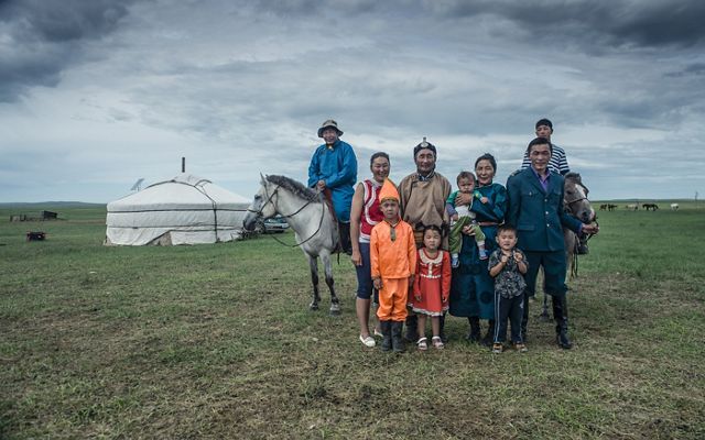 
A herder named Otgonbaatar and his family at their home on the grassland steppe of Eastern Mongolia's Toson Khulstai Nature Reserve