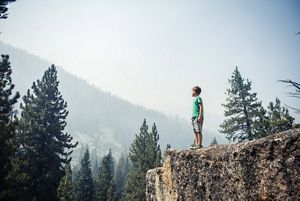 TNC ecologist Greg Golet looks through a spotting scope exploring Sequoia National Park in California.