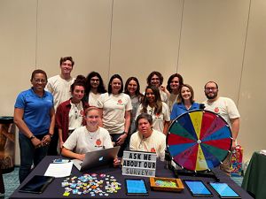People grouped together for a photo at an event.