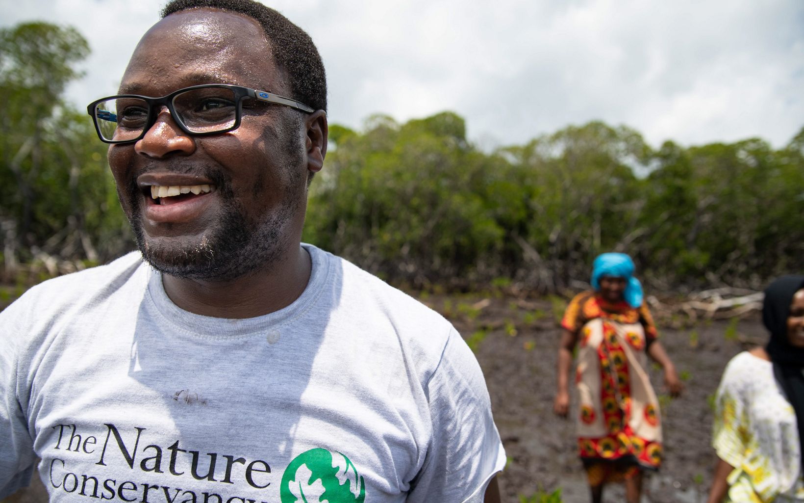TNC Africa Fisheries Strategy Manager George Maina leads a mangrove restoration project in Lamu, Kenya. "Mangroves are the tropical rainforests of the ocean," George says. 

