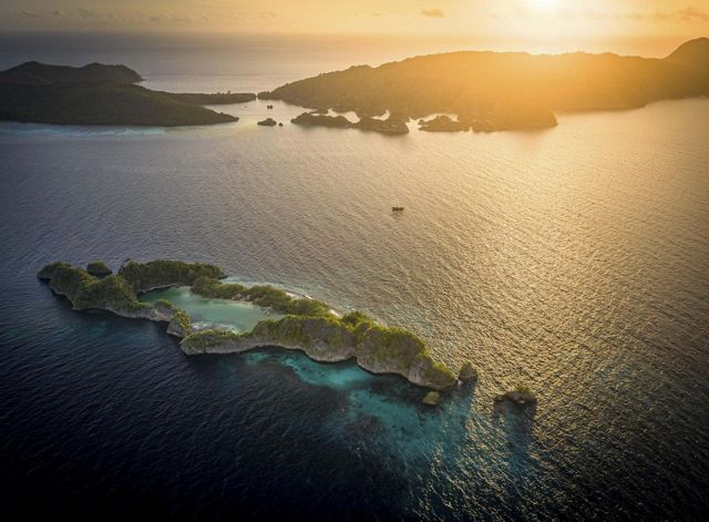 A reef in Raja Ampat during the sunset. 