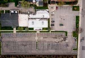 Aerial of the Sacred Heart Church parking lot before installation of GSI features.