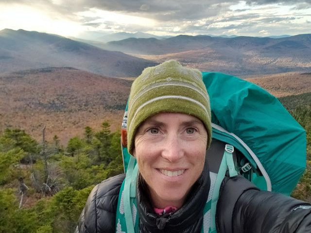 Samantha Horn, Director of Science for TNC in Maine, takes a selfie on a solo backpacking trip in the Mahoosuc mountains.