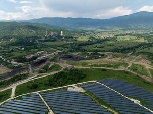 aerial view of solar park in fields.