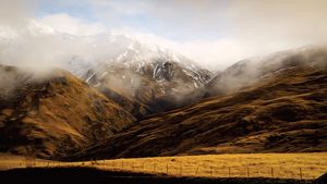  Mountains with misty low clouds.