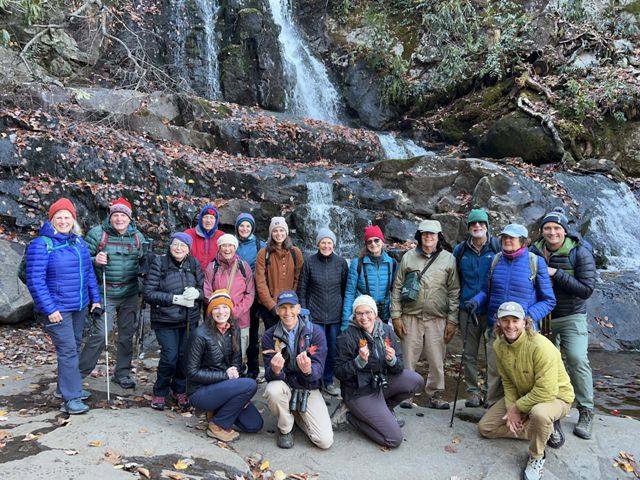 Participants of the Discover with Nature trip to Tennessee pose at the apex of a trail in Great Smoky Mountain National Park.